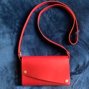 FOLD Red Lemur Clutch design w removable straps